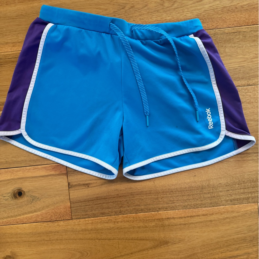 Size small blue and‎ purple Reebok ladies running shorts